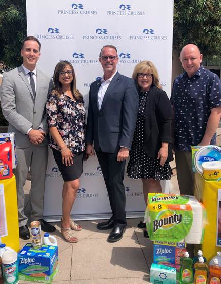 Left to right: Family Promise vice president Jerrid McKenna, Princess Cruises programs and events specialist Paula Triggs, Princess Cruises vice president of bBrand and corporate communications Brian O’Connor, Family Promise former president Laurie Ender, and Family Promise executive director Roche Vermaak gather as Princess Cruises makes a donation to Family Promise as part of their Summer Sizzle Series of community outreach. Courtesy of Alivia Owyoung